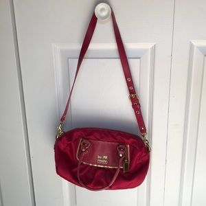 Pink satin and leather coach purse